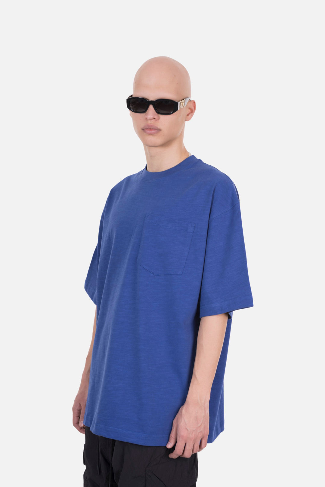 An oversized blue T-shirt with a front pocket