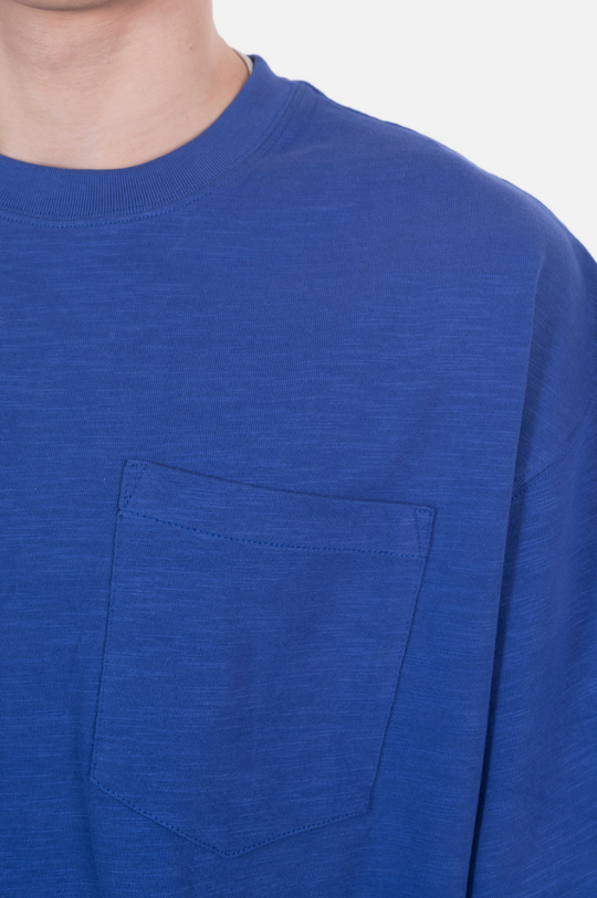 An oversized blue T-shirt with a front pocket
