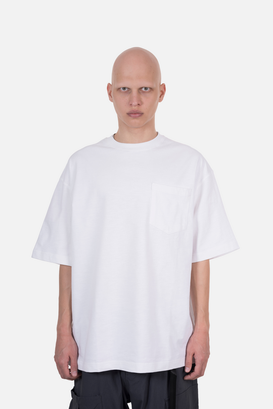An oversized white T-shirt with a pocket design