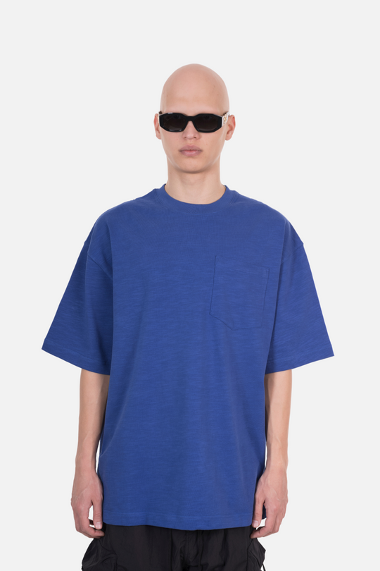 An oversized blue T-shirt with a front pocket
