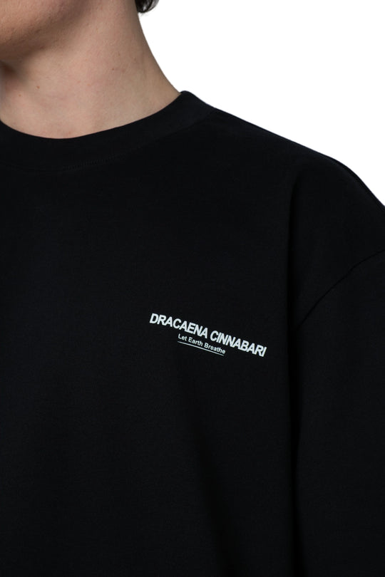 تيشيرت أوفرسايز رجالي بطبعة خلفية