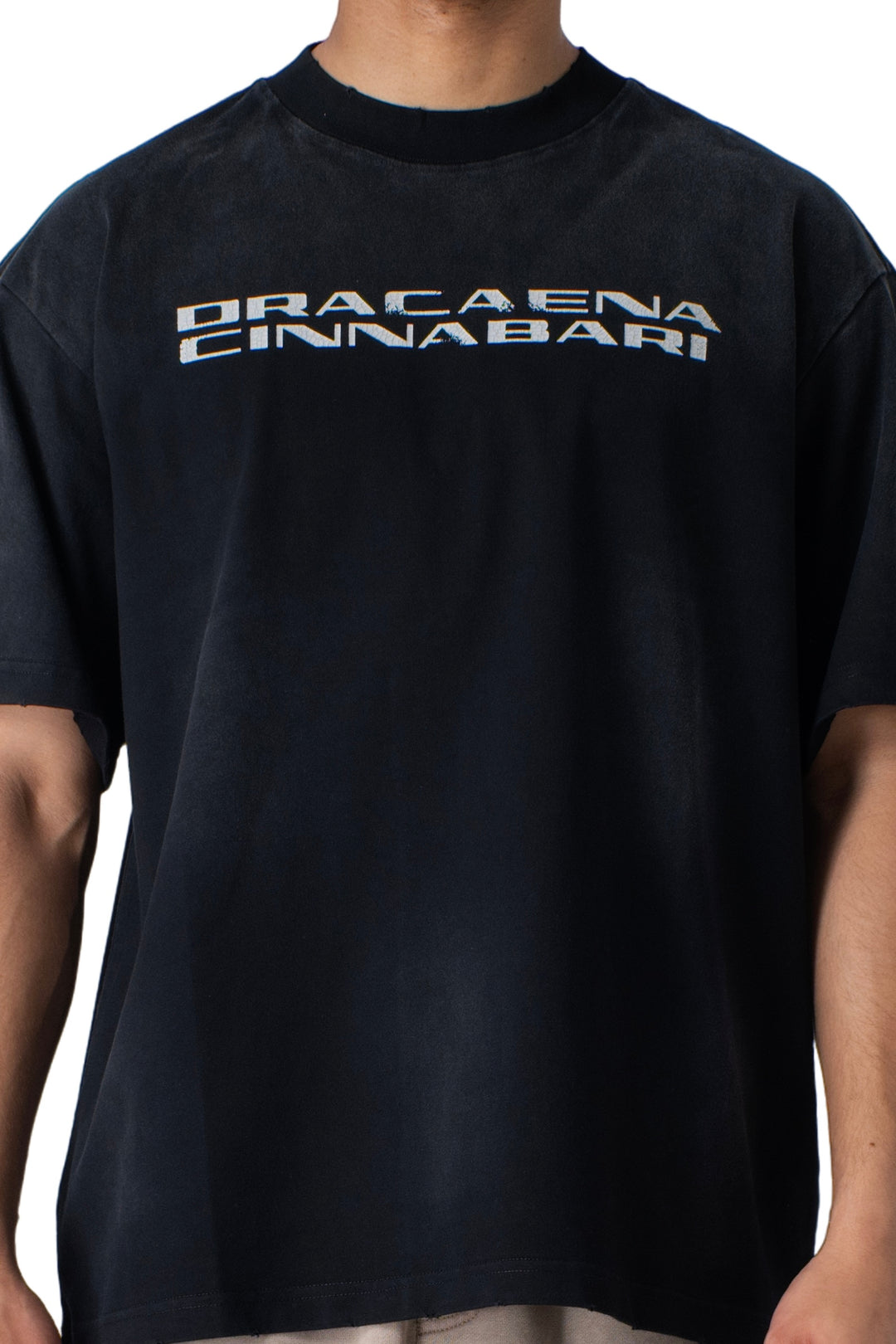 black t-shirt with dracaena cinnabari text
